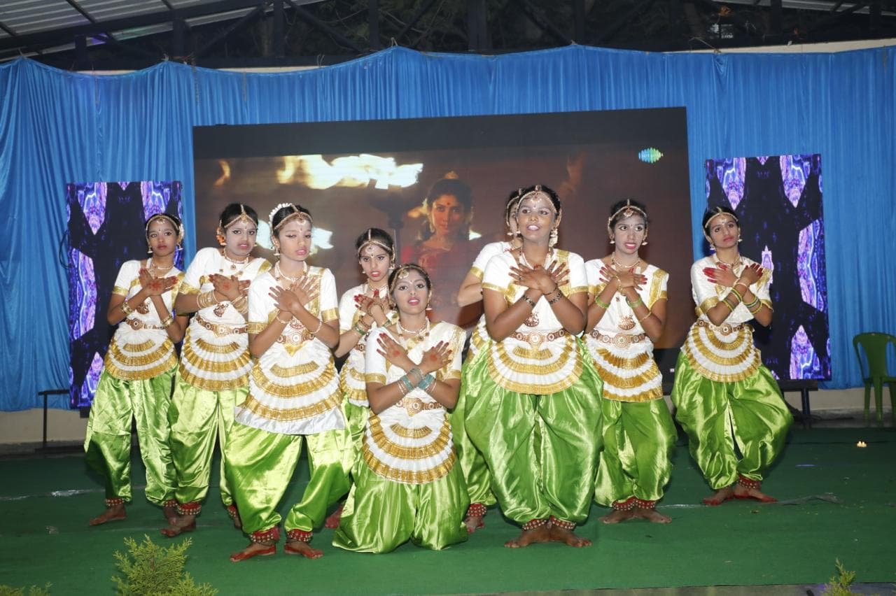 School Day celebration — students performing